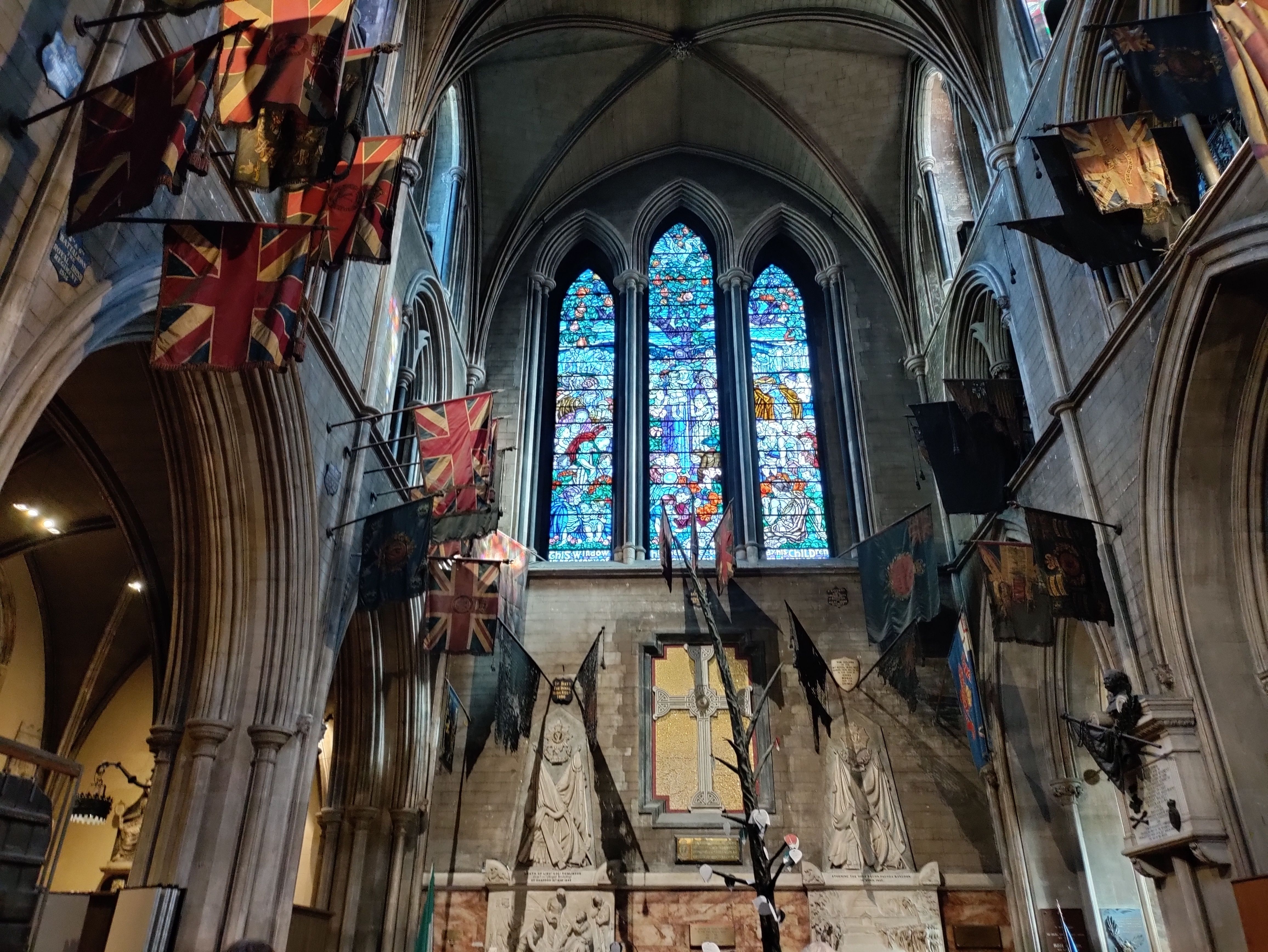 Stained glass window about the Tree of Remembrance.